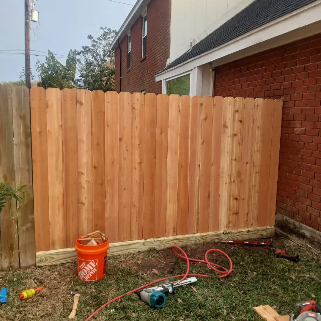 Newly built cedar privacy fence